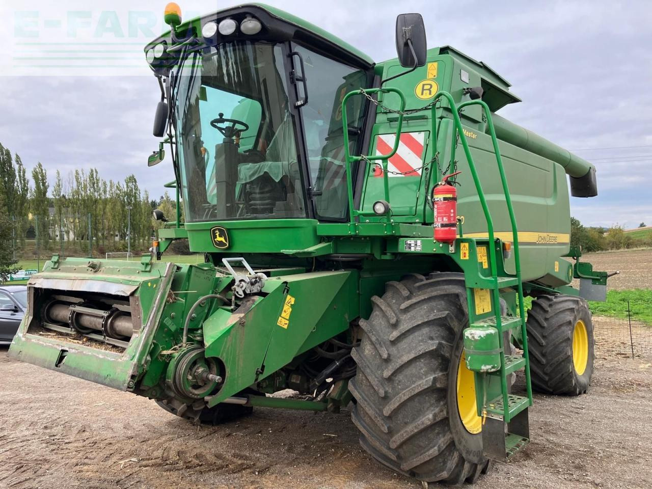 John Deere W660 HM - Moissonneuse-batteuse: photos 1 John Deere W660 HM - Moissonneuse-batteuse: photos 1