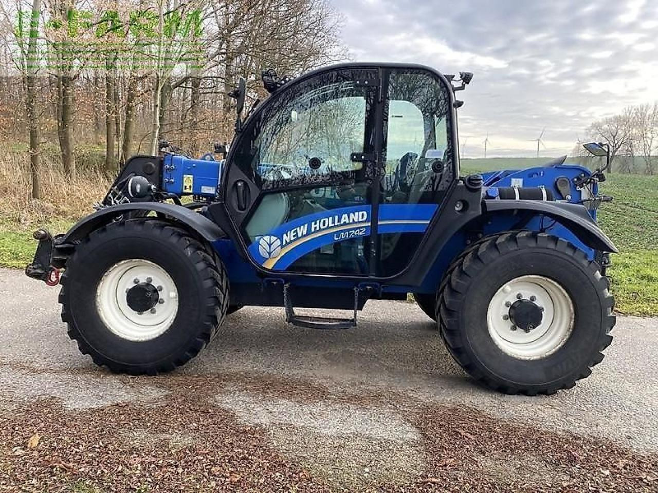 New Holland lm 7.42 - Chariot télescopique: photos 1 New Holland lm 7.42 - Chariot télescopique: photos 1