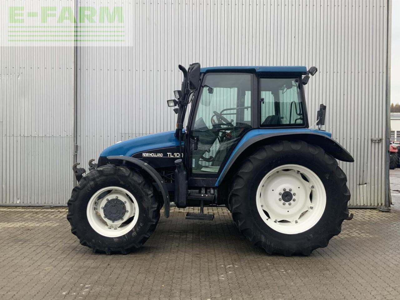New Holland tl 100 - Tracteur agricole: photos 1 New Holland tl 100 - Tracteur agricole: photos 1