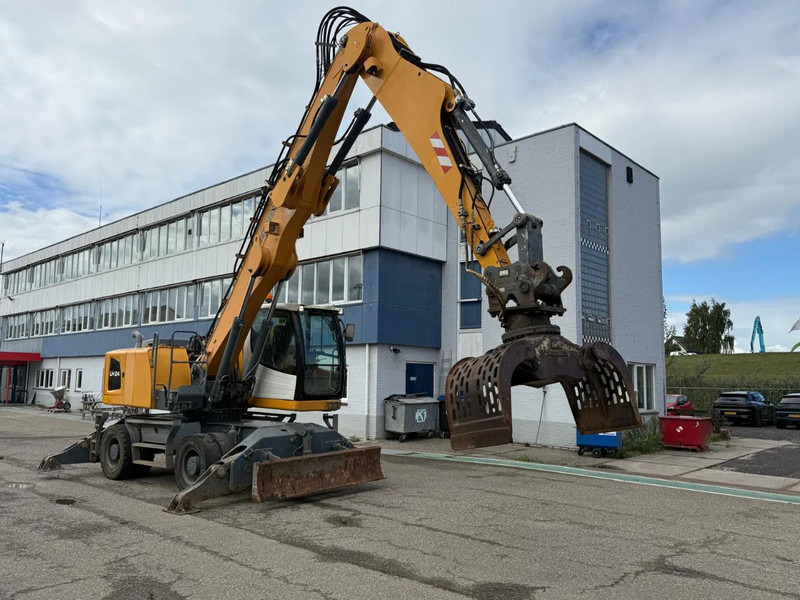 Liebherr LH 24 M LITRONIC DUTCH REGISTRATION LANDBOUW KENTEKEN - Pelle de manutention: photos 1 Liebherr LH 24 M LITRONIC DUTCH REGISTRATION LANDBOUW KENTEKEN - Pelle de manutention: photos 1