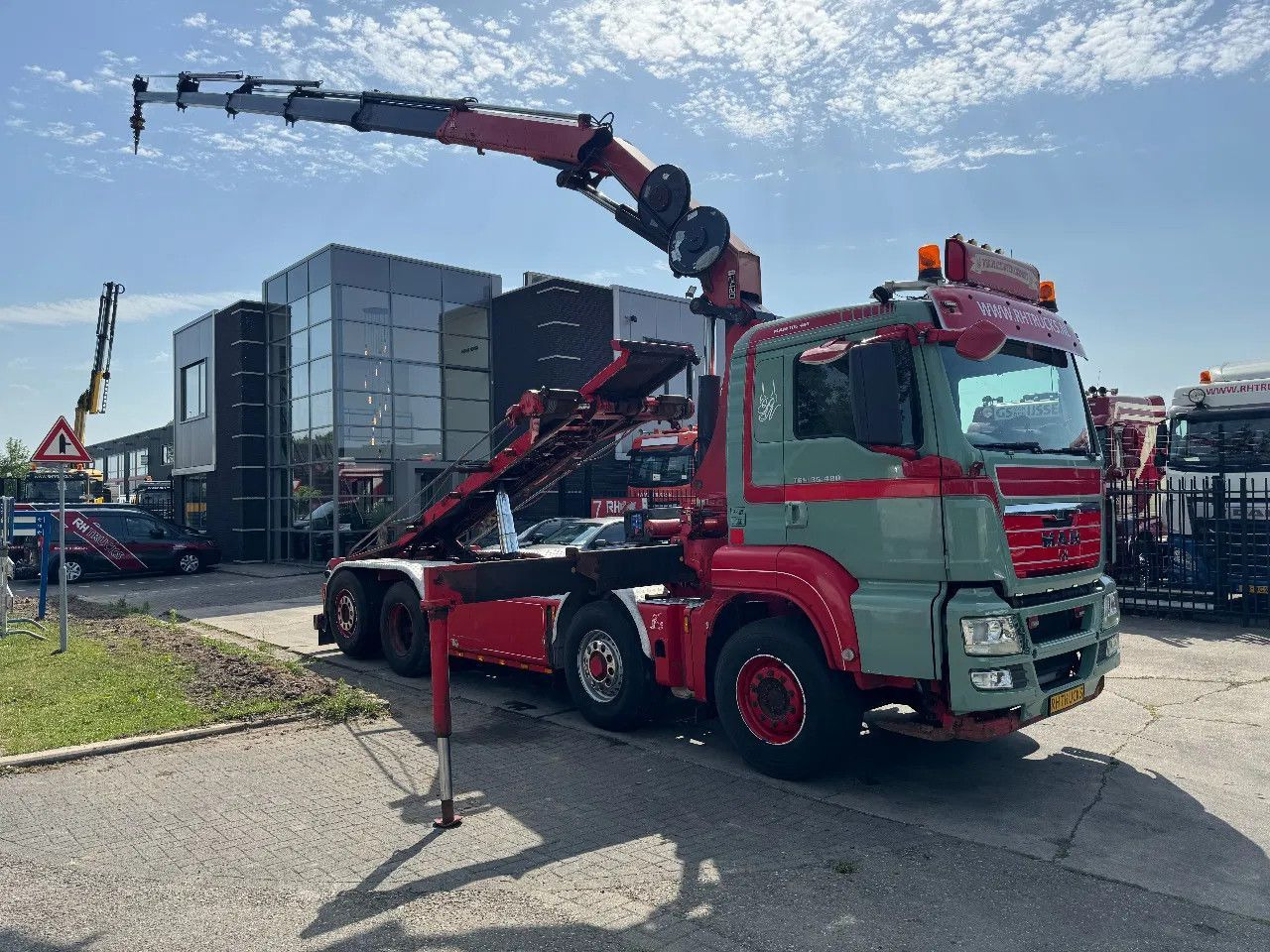 MAN TGS 35.480 8X4 HMF 2420 K5 + HMF ABLE + REMOTE C - Camion ampliroll, Camion grue: photos 1 MAN TGS 35.480 8X4 HMF 2420 K5 + HMF ABLE + REMOTE C - Camion ampliroll, Camion grue: photos 1