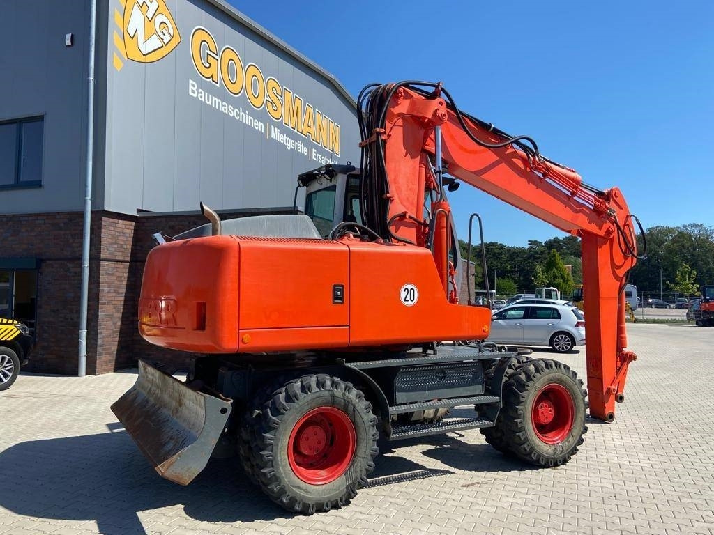 Pelle sur pneus Liebherr A 900 C: photos 10