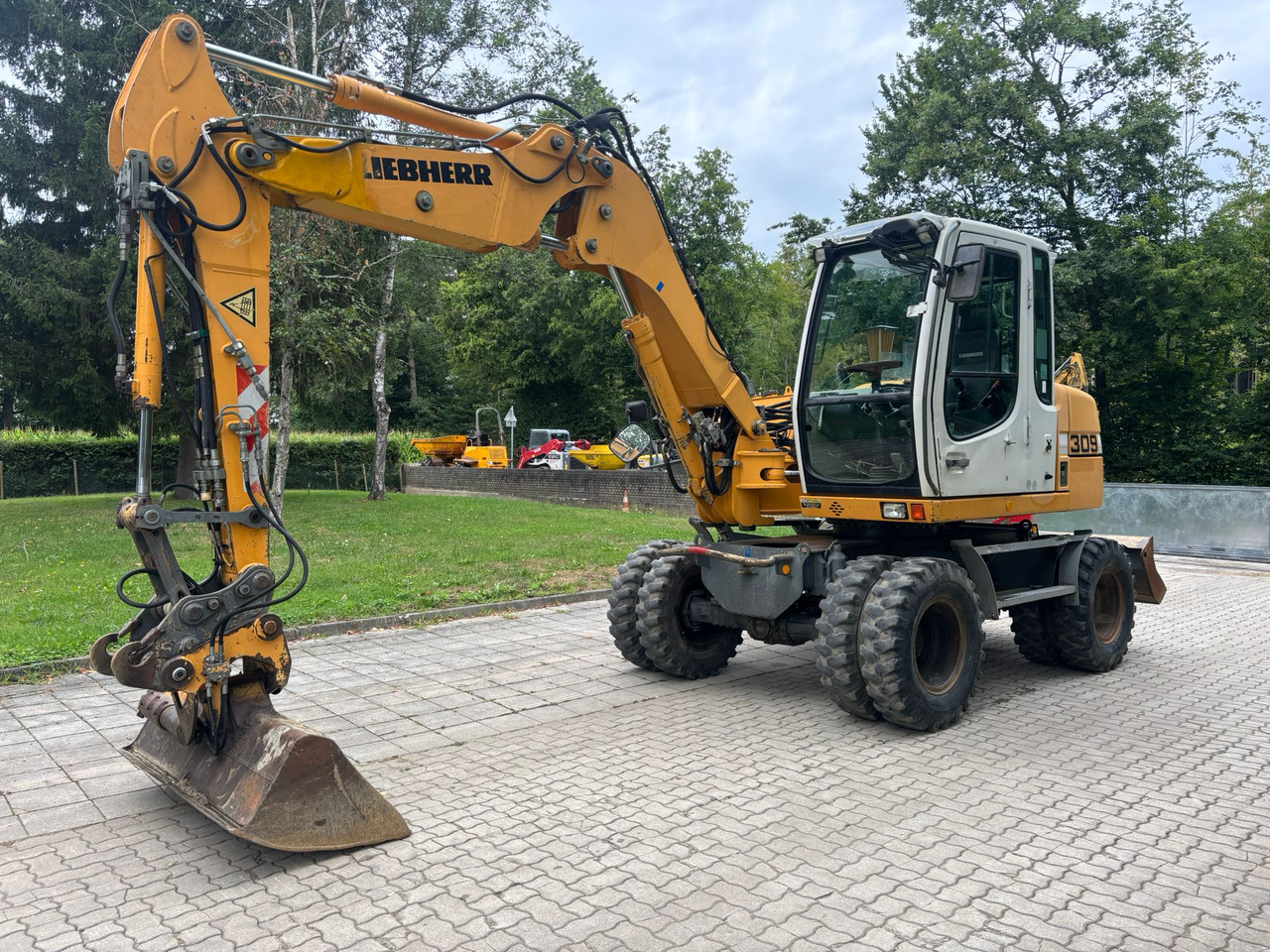 LIEBHERR A 309 Litronic - Pelle sur pneus: photos 3 LIEBHERR A 309 Litronic - Pelle sur pneus: photos 3