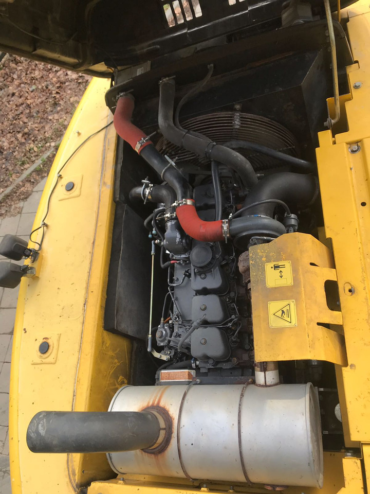 Pelle sur chenille NEW HOLLAND E 215 B: photos 11