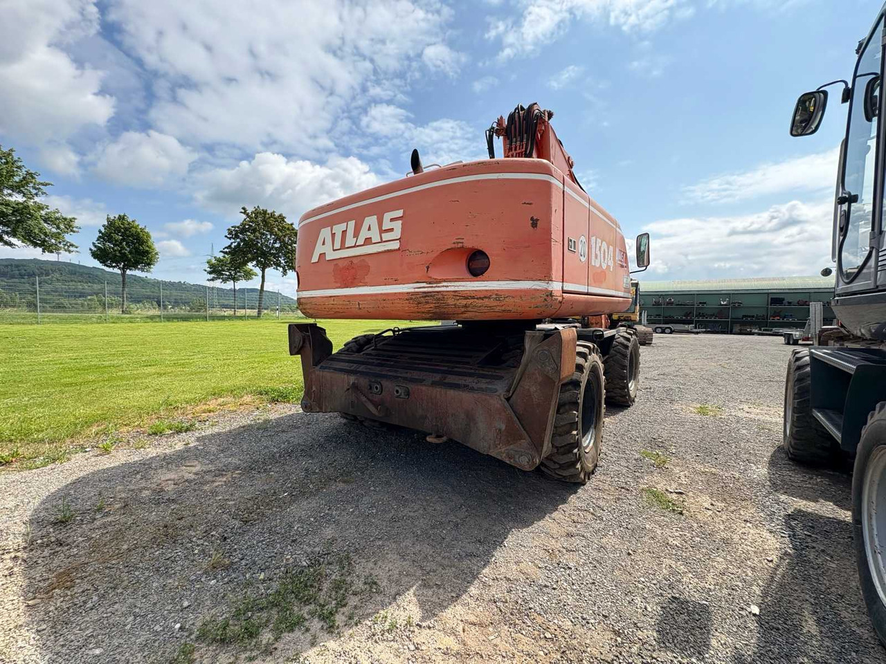 Atlas 1504 - Pelle sur pneus: photos 4 Atlas 1504 - Pelle sur pneus: photos 4