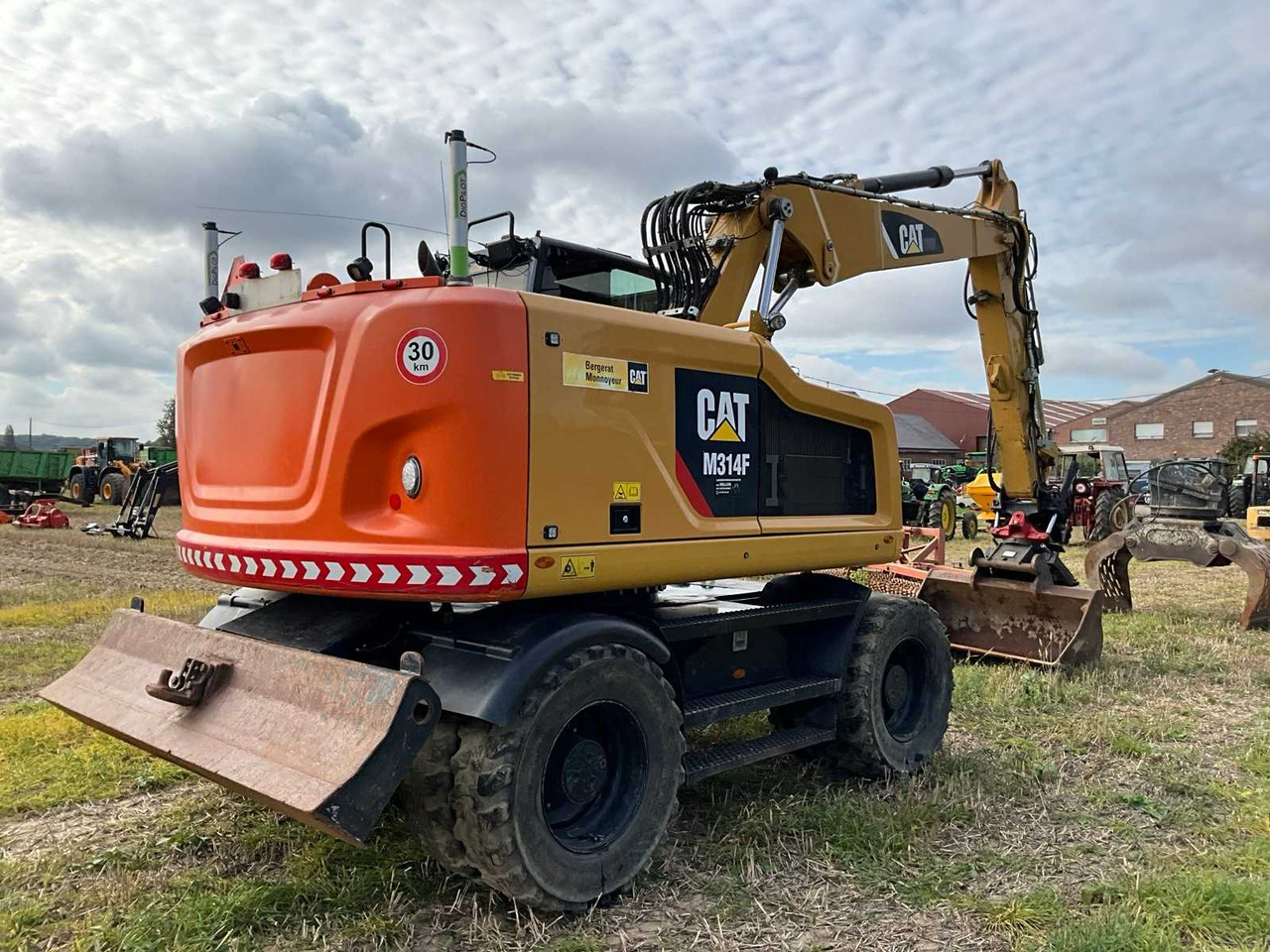 Caterpillar M314F - Pelle sur pneus: photos 4 Caterpillar M314F - Pelle sur pneus: photos 4