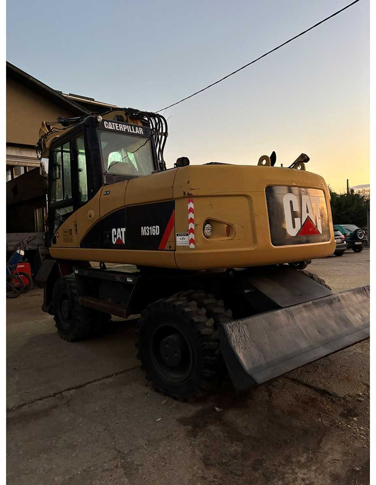 Caterpillar M316D - Pelle sur pneus: photos 5 Caterpillar M316D - Pelle sur pneus: photos 5