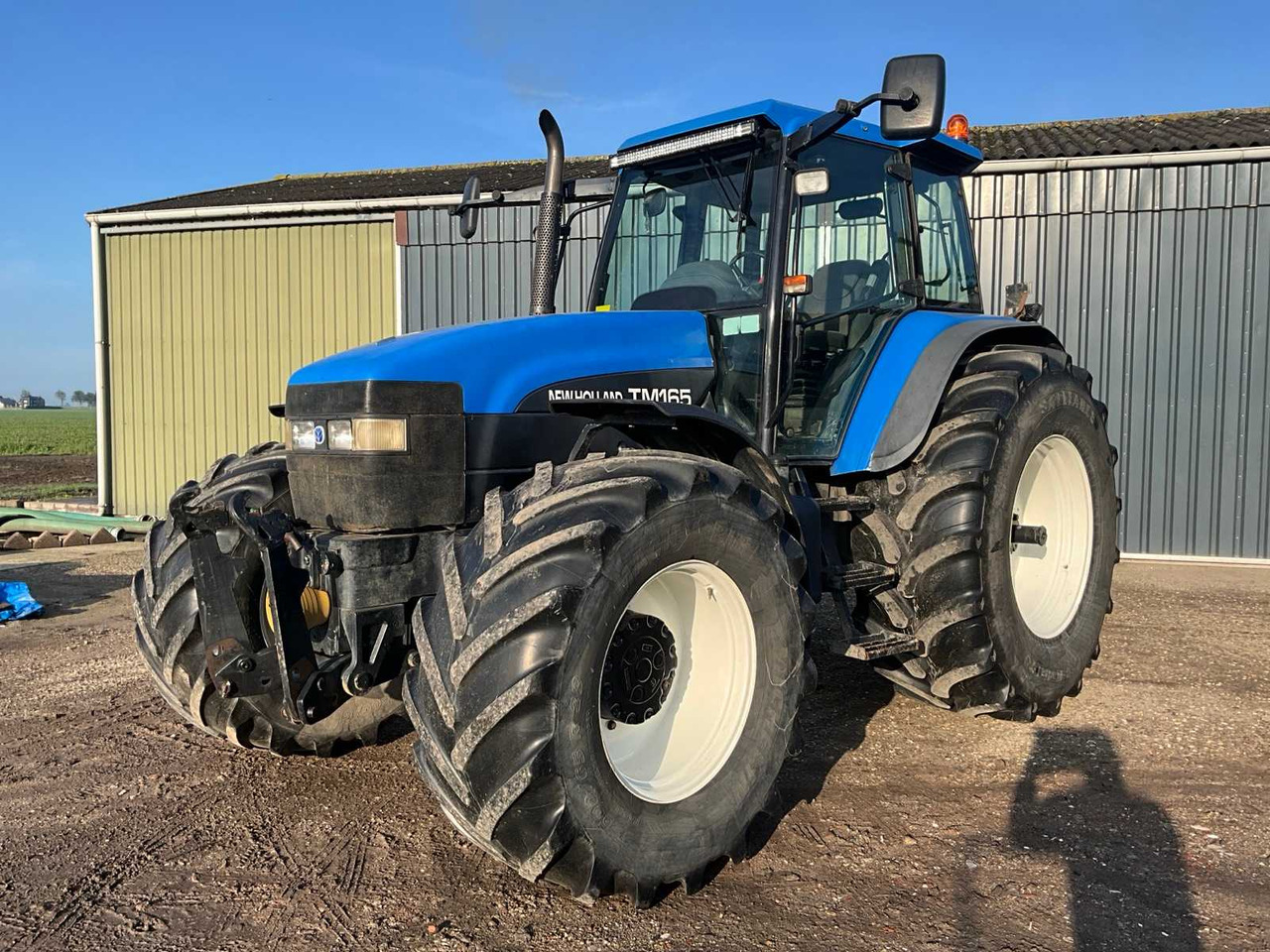 New Holland TM165 - Tracteur agricole: photos 1 New Holland TM165 - Tracteur agricole: photos 1
