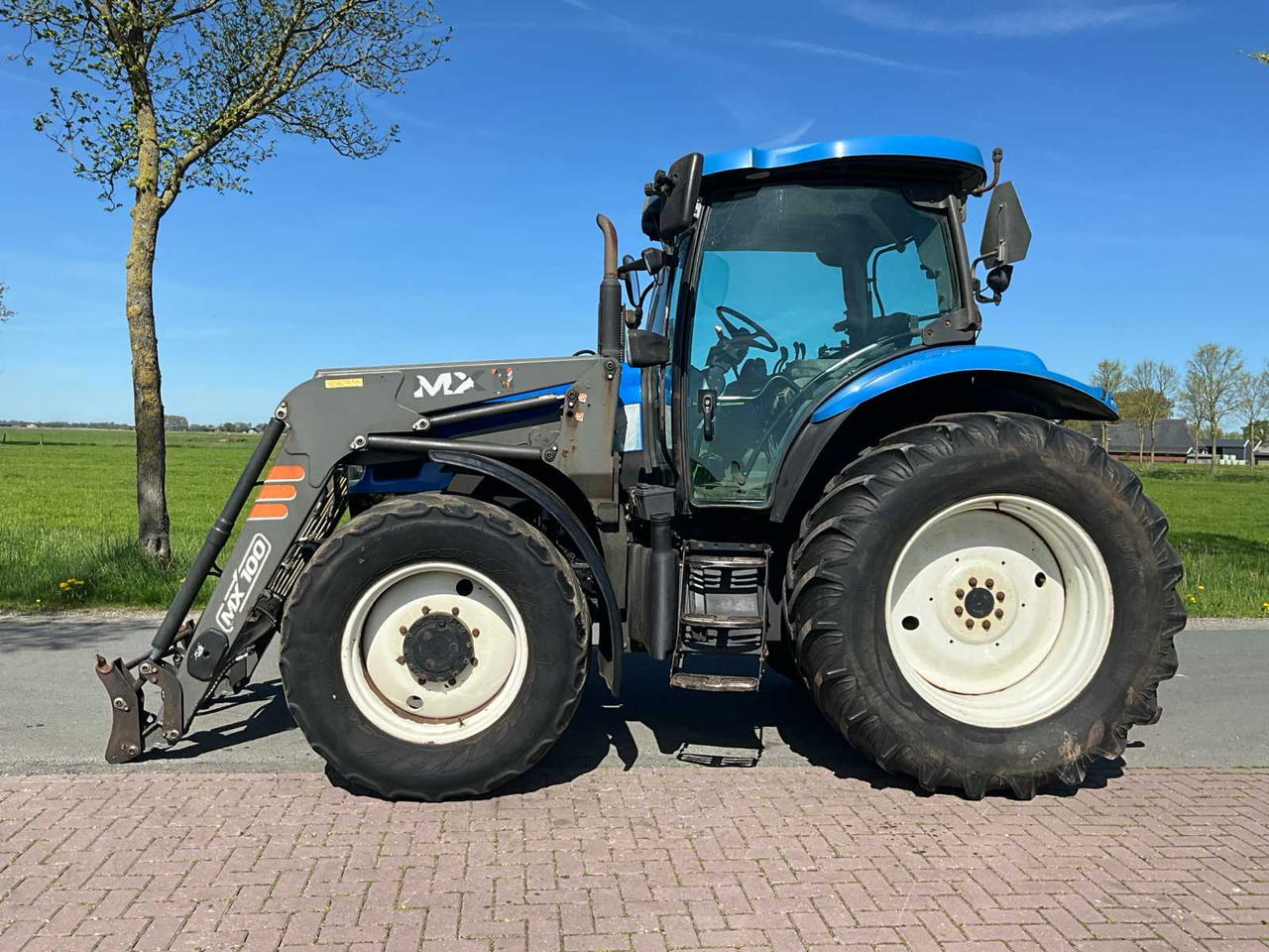New Holland TS100A - Tracteur agricole: photos 5 New Holland TS100A - Tracteur agricole: photos 5
