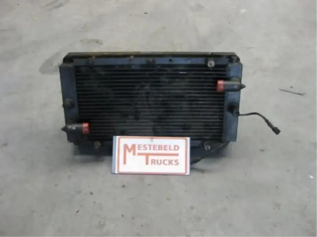 DAF Oliekoeler automaatbak LF 55 - Boîte de vitesse et pièces pour Camion: photos 1 DAF Oliekoeler automaatbak LF 55 - Boîte de vitesse et pièces pour Camion: photos 1