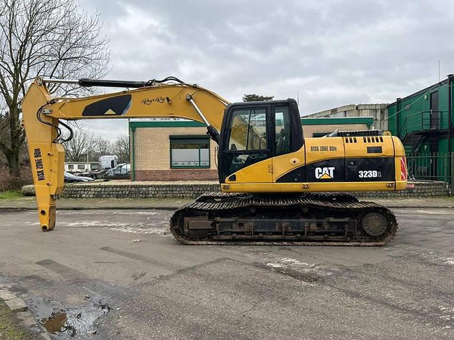 Caterpillar 323DL - 323 DL - 323D - Pelle: photos 1 Caterpillar 323DL - 323 DL - 323D - Pelle: photos 1