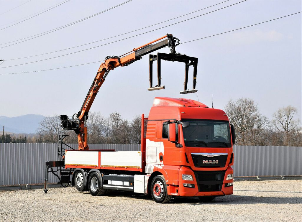 MAN TGX 26.440 Pritsche 6,60 m*TEREX 135.2-A11 MAN TGX 26.440 Pritsche 6,60 m*TEREX 135.2-A11 - Camion grue: photos 1 MAN TGX 26.440 Pritsche 6,60 m*TEREX 135.2-A11 MAN TGX 26.440 Pritsche 6,60 m*TEREX 135.2-A11 - Camion grue: photos 1
