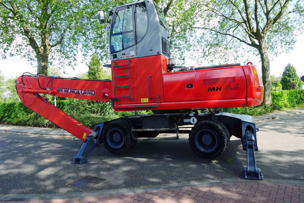New Holland MH 6.6 Materialhandler With Magnet System - Pelle de manutention: photos 5 New Holland MH 6.6 Materialhandler With Magnet System - Pelle de manutention: photos 5