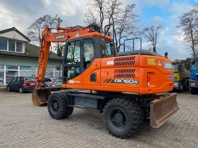 Doosan DX 160 W-3 - Pelle sur pneus: photos 4 Doosan DX 160 W-3 - Pelle sur pneus: photos 4