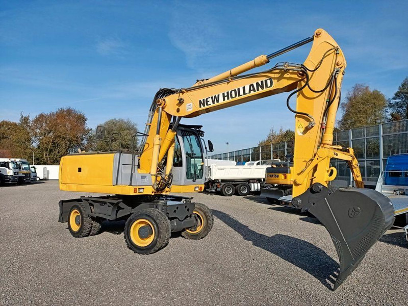 New Holland WE 190 - Pelle sur pneus: photos 4 New Holland WE 190 - Pelle sur pneus: photos 4