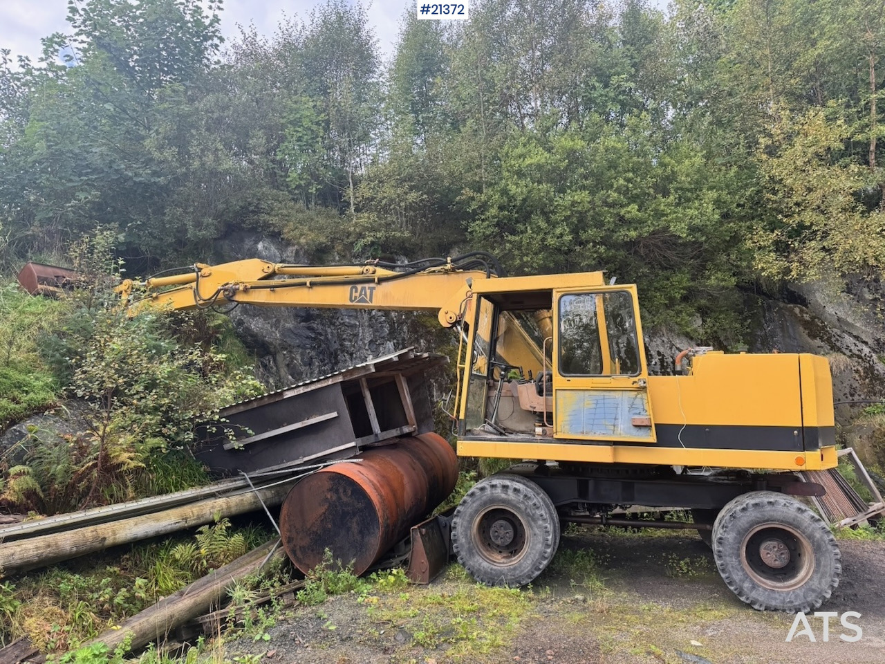 Caterpillar 212B - Pelle sur pneus: photos 1 Caterpillar 212B - Pelle sur pneus: photos 1
