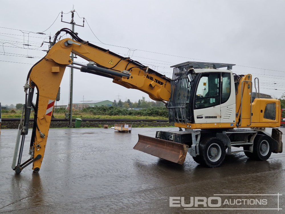 2014 Liebherr LH22 - Pelle sur pneus: photos 1 2014 Liebherr LH22 - Pelle sur pneus: photos 1