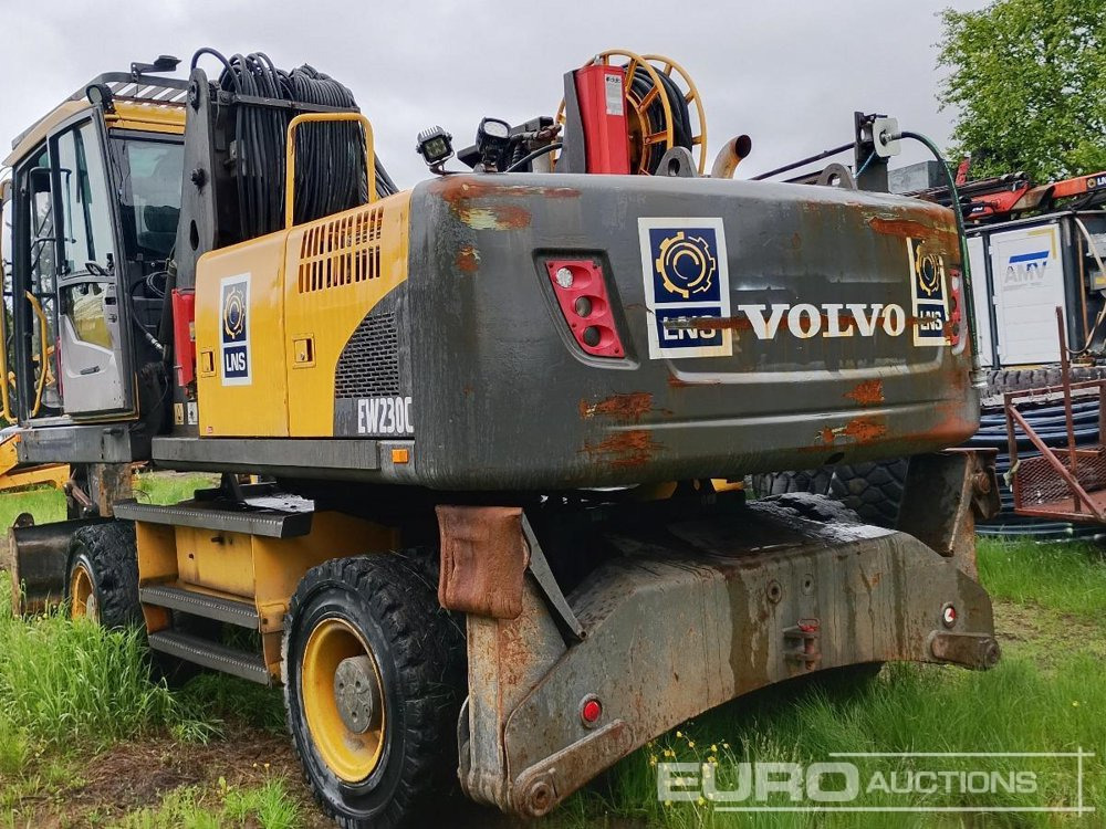 2014 Volvo EW230C - Pelle sur pneus: photos 5 2014 Volvo EW230C - Pelle sur pneus: photos 5