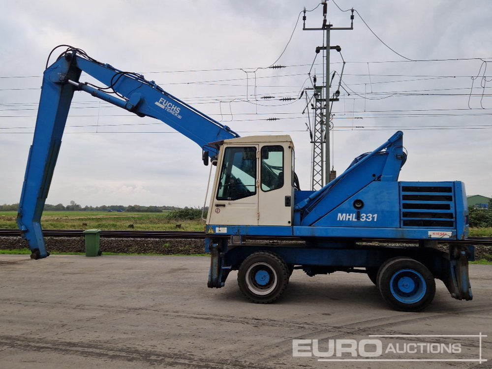 Fuchs MHL331 - Pelle sur pneus: photos 2 Fuchs MHL331 - Pelle sur pneus: photos 2