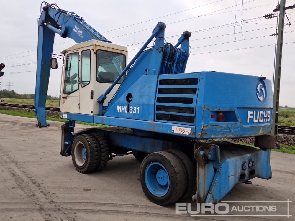 Fuchs MHL331 - Pelle sur pneus: photos 3 Fuchs MHL331 - Pelle sur pneus: photos 3