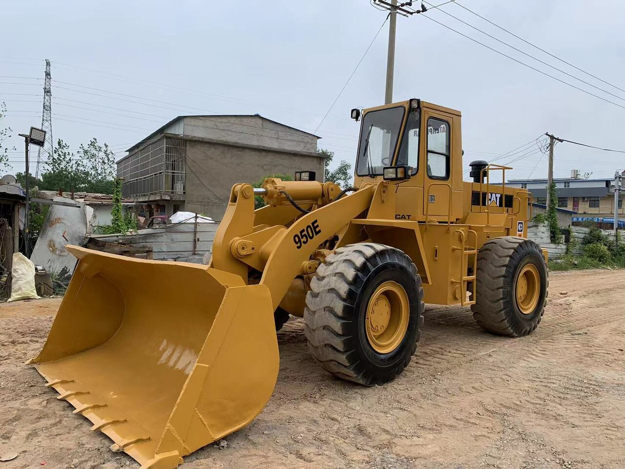 CATERPILLAR 950E - Chargeuse sur pneus: photos 1 CATERPILLAR 950E - Chargeuse sur pneus: photos 1