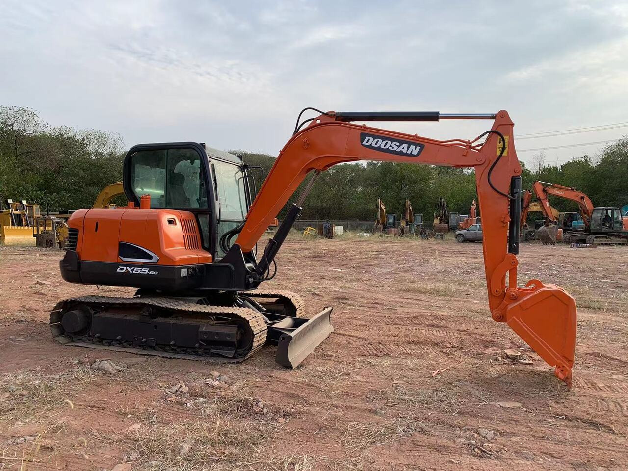 DOOSAN DX55 - Pelle: photos 1 DOOSAN DX55 - Pelle: photos 1