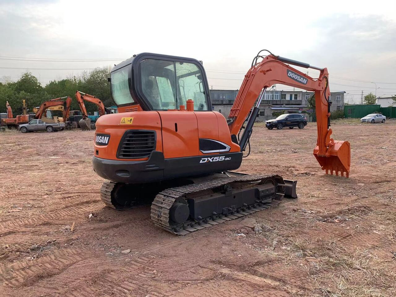 DOOSAN DX55 - Pelle: photos 1 DOOSAN DX55 - Pelle: photos 1