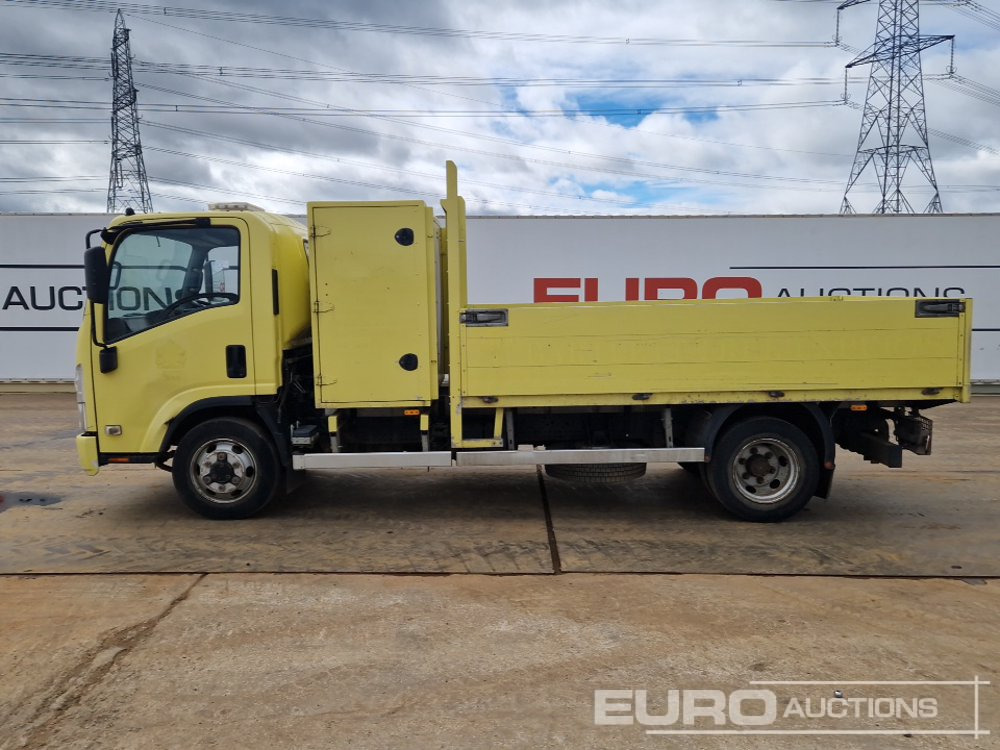2012 Isuzu NPR-6 N62.150M - Camion plateau: photos 2 2012 Isuzu NPR-6 N62.150M - Camion plateau: photos 2