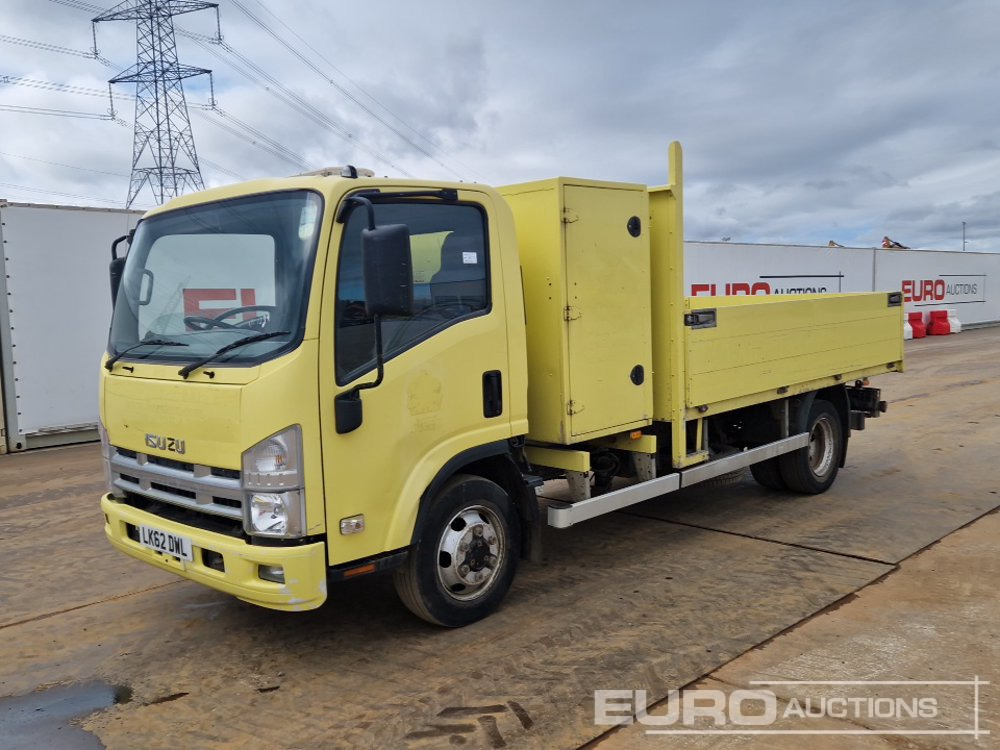 2012 Isuzu NPR-6 N62.150M - Camion plateau: photos 1 2012 Isuzu NPR-6 N62.150M - Camion plateau: photos 1