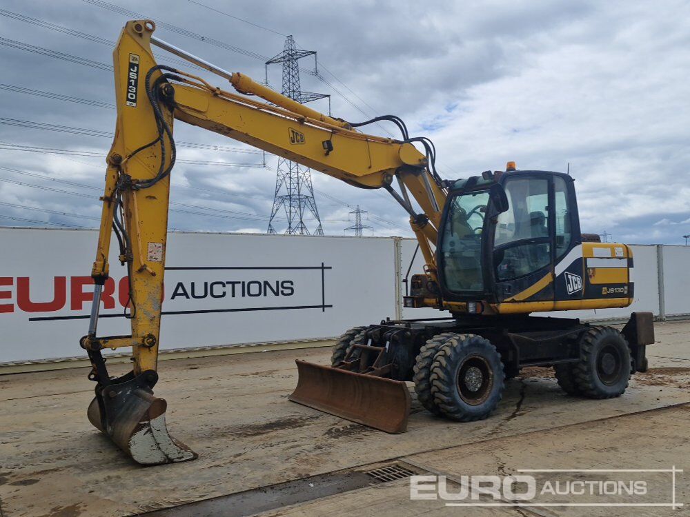 JCB JS130W - Pelle sur pneus: photos 1 JCB JS130W - Pelle sur pneus: photos 1