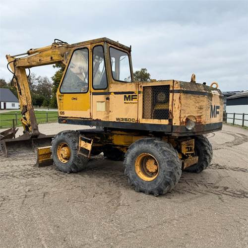 Massey Ferguson W350 C - Pelle sur pneus: photos 2 Massey Ferguson W350 C - Pelle sur pneus: photos 2