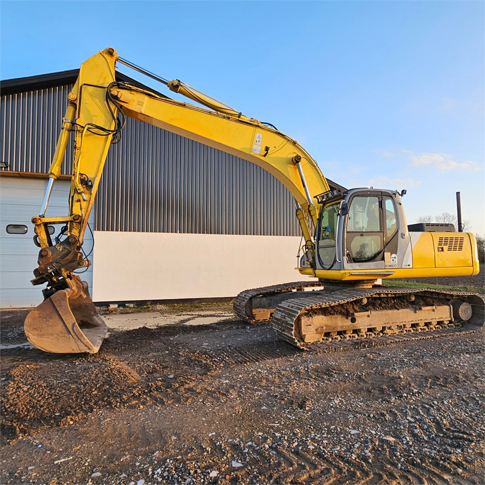 New Holland E 305 - Pelle sur chenille: photos 1 New Holland E 305 - Pelle sur chenille: photos 1
