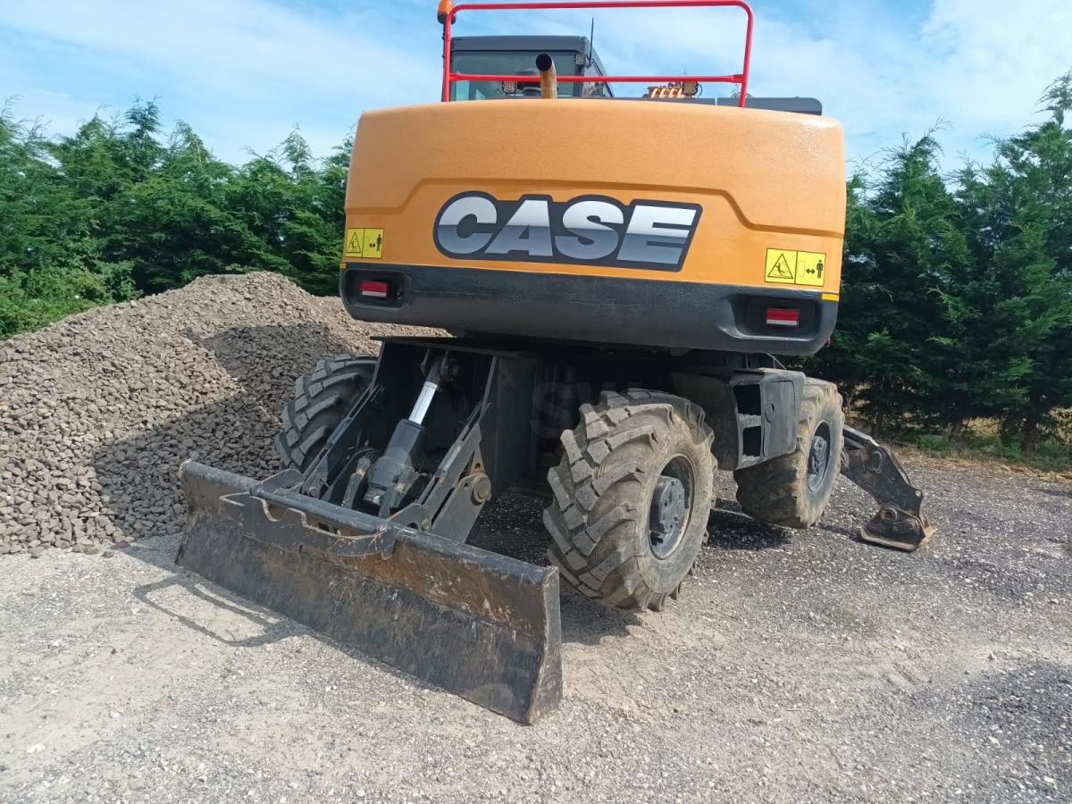 Case WX150 - Pelle sur pneus: photos 5 Case WX150 - Pelle sur pneus: photos 5