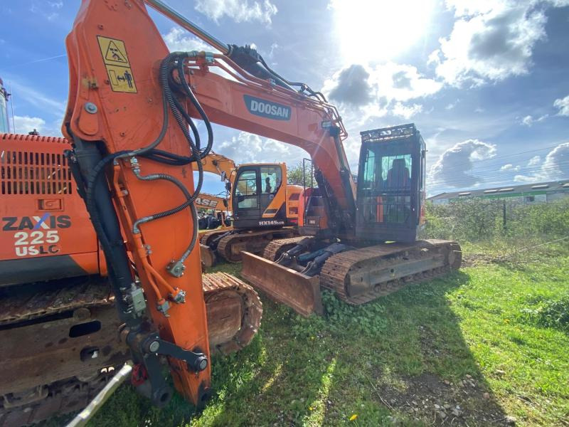 Doosan DX 140 LCR-5 - Pelle sur chenille: photos 1 Doosan DX 140 LCR-5 - Pelle sur chenille: photos 1