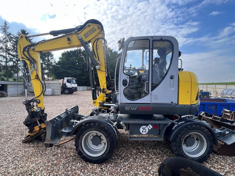Neuson EW 100 - Pelle sur pneus: photos 5 Neuson EW 100 - Pelle sur pneus: photos 5