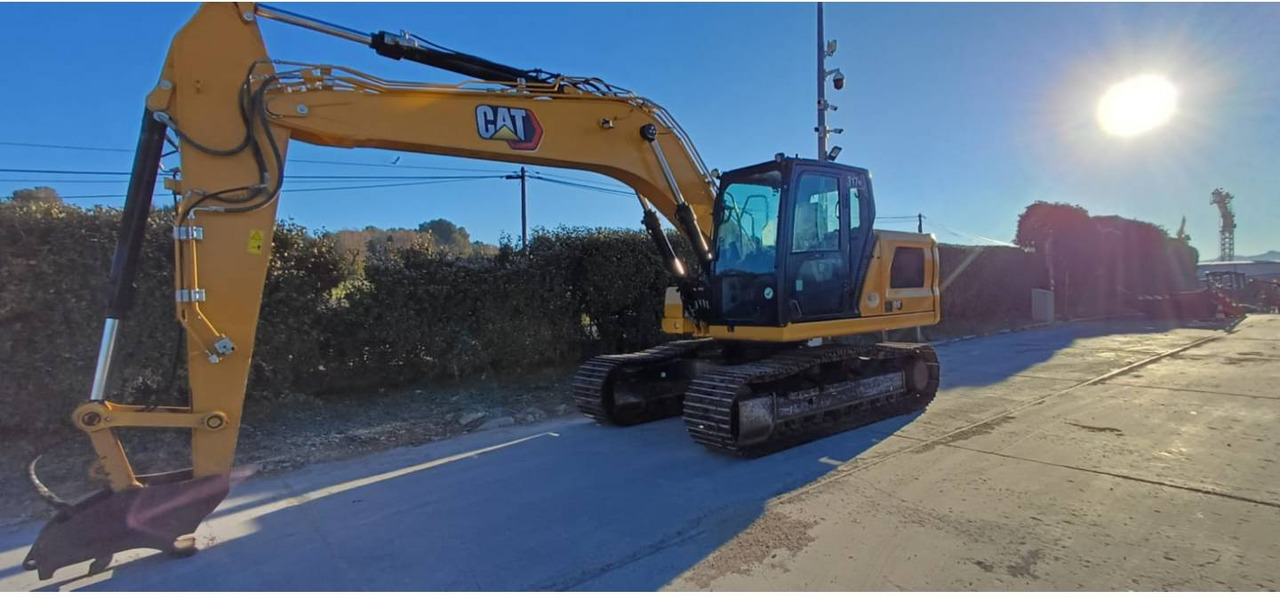 Pelle sur chenille CAT 317 GC: photos 7