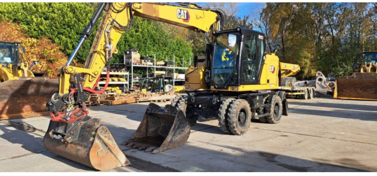 CAT M315-07 - Pelle sur pneus: photos 1 CAT M315-07 - Pelle sur pneus: photos 1