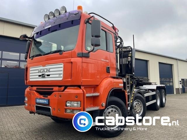 MAN TGA 41.440 8X4 BB Palfinger Epsilon Z-Kraan bouwjaar 2011 + NCH 30 Ton's Kabel-containersyteem - Handgeschakeld - Bouwjaar 2007 - Km 582.782 - Camion grue: photos 1 MAN TGA 41.440 8X4 BB Palfinger Epsilon Z-Kraan bouwjaar 2011 + NCH 30 Ton's Kabel-containersyteem - Handgeschakeld - Bouwjaar 2007 - Km 582.782 - Camion grue: photos 1