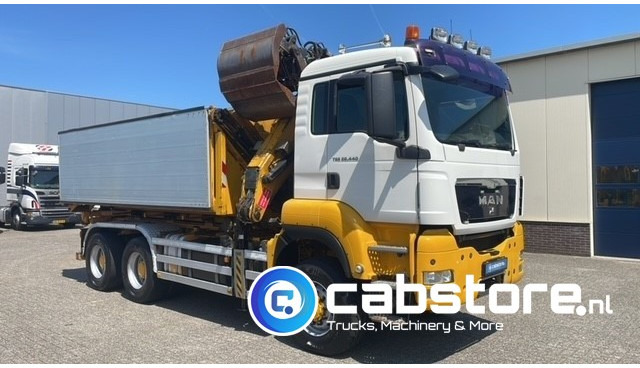 MAN TGS 26.440 6X6 BB EEV MAN TGS 26.440 Euro 5 EEV - 6X6 - Laadkraan - Kipper - Kabelsysteem - Bouwjaar 2010 - Km 657.509 - APK tot 22-11-2025 !! - Camion grue: photos 1 MAN TGS 26.440 6X6 BB EEV MAN TGS 26.440 Euro 5 EEV - 6X6 - Laadkraan - Kipper - Kabelsysteem - Bouwjaar 2010 - Km 657.509 - APK tot 22-11-2025 !! - Camion grue: photos 1