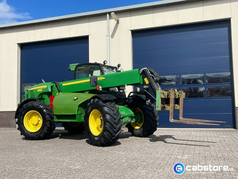John Deere 3415 Verreiker met vorken en laadschop - Machine agricole: photos 1 John Deere 3415 Verreiker met vorken en laadschop - Machine agricole: photos 1