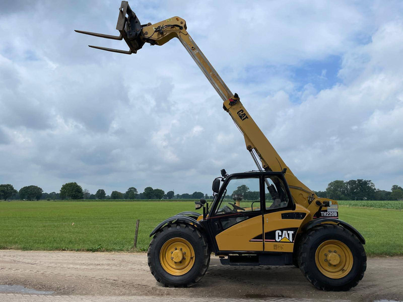Caterpillar TH220B - Chariot télescopique: photos 1 Caterpillar TH220B - Chariot télescopique: photos 1