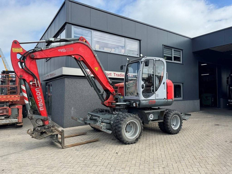 Neuson 9503WD - Pelle sur pneus: photos 3 Neuson 9503WD - Pelle sur pneus: photos 3