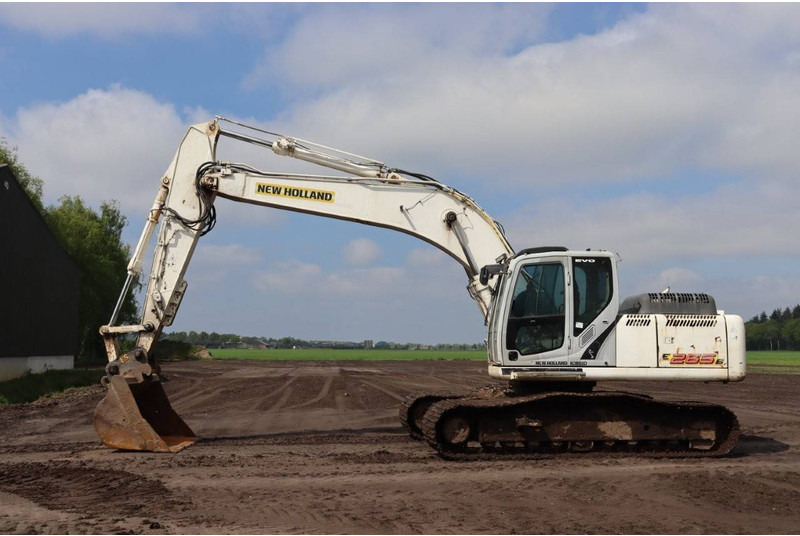 New Holland Kobelco E265B EVO - Pelle sur chenille: photos 1 New Holland Kobelco E265B EVO - Pelle sur chenille: photos 1