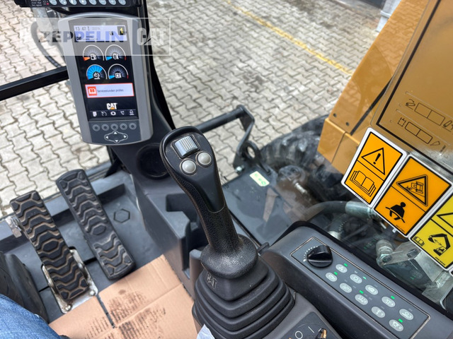 Pelle sur pneus Cat M314F: photos 27