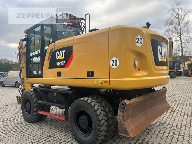 Pelle sur pneus Cat M320F: photos 7
