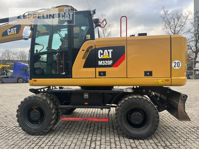 Pelle sur pneus Cat M320F: photos 8