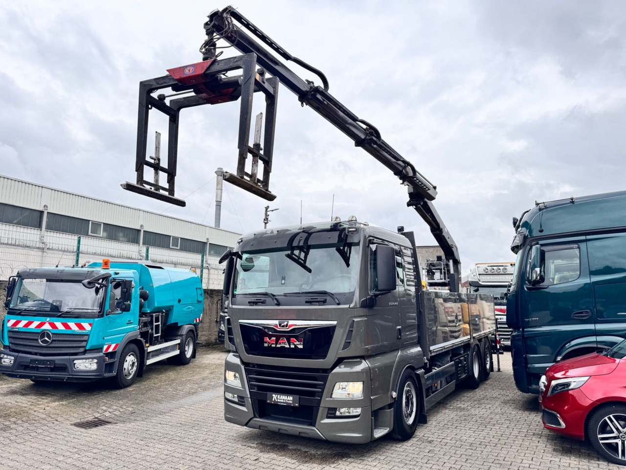 MAN 26.460 TGX Baustoffkran HMF 2110-L3 - Camion grue: photos 4 MAN 26.460 TGX Baustoffkran HMF 2110-L3 - Camion grue: photos 4