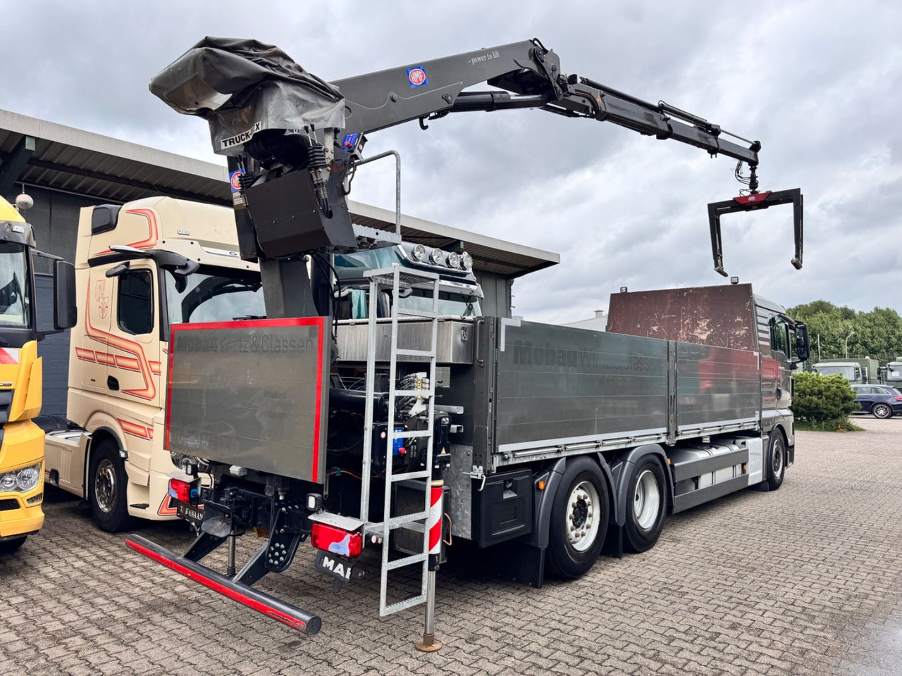 MAN 26.460 TGX Baustoffkran HMF 2110-L3 - Camion grue: photos 5 MAN 26.460 TGX Baustoffkran HMF 2110-L3 - Camion grue: photos 5